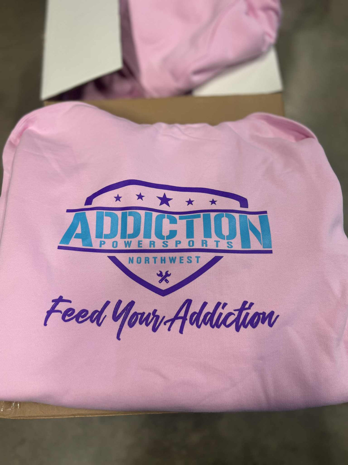 Addiction Powersports NW Pull Over Hoodie Light Pink with Purple and Blue Logo